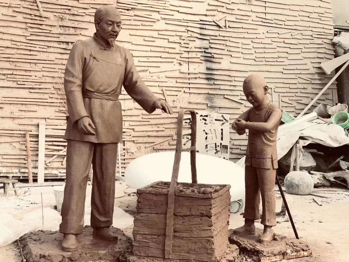 卖货郎人物雕塑